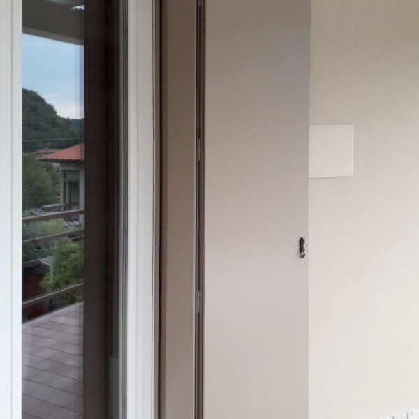 Scuri alla padovana con ante a doghe liscie