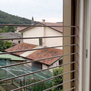 Scuri alla padovana con ante a doghe liscie